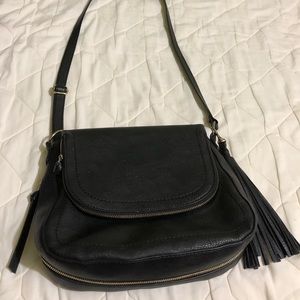 Black leather purse with tassel